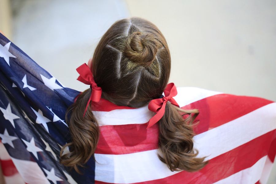 patriotic girl in flag